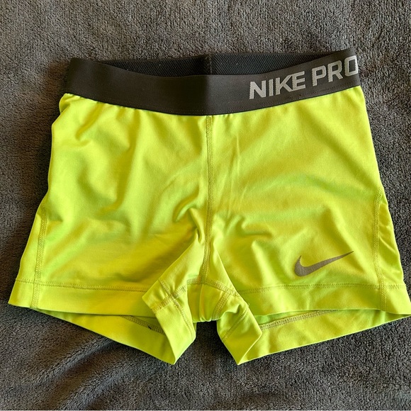 yellow nike compression shorts